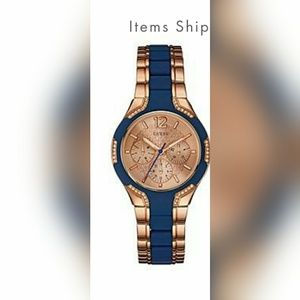 GUESS blue and rose gold tone watch
